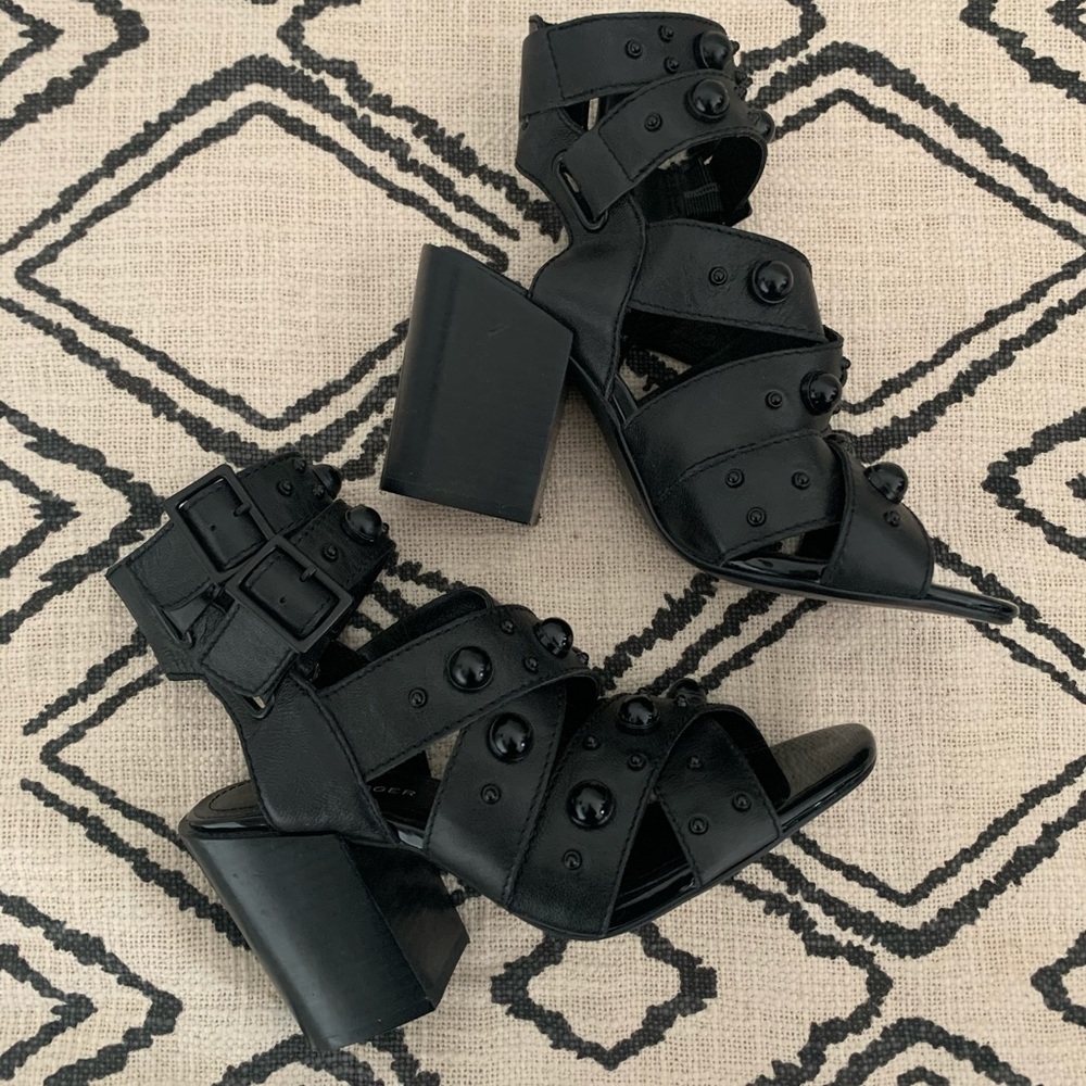 Black heeled sandals with black pearl detail!